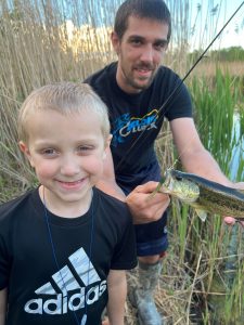 fishing with kids, kid with bass