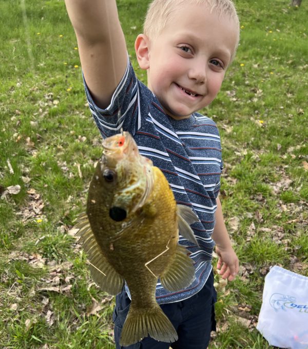 fishing with a kid, kid with bluegill