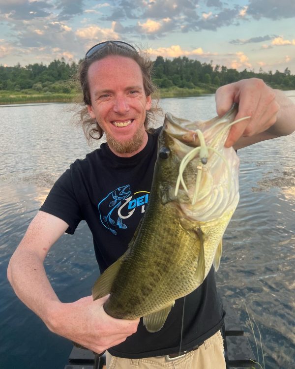 big bass caught on the squirm bass fishing jig