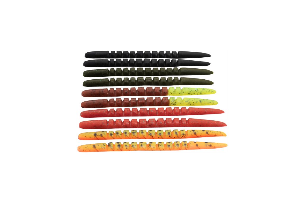DeLong Lures color selection guide showing a variety of bass fishing lures in Fire Tiger, Junebug, Green Pumpkin, and other top colors.