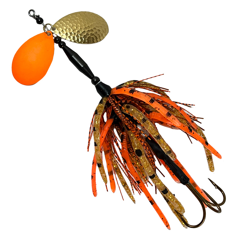 Muskie bucktail fishing lure with blades, rubber skirts, and treble hook