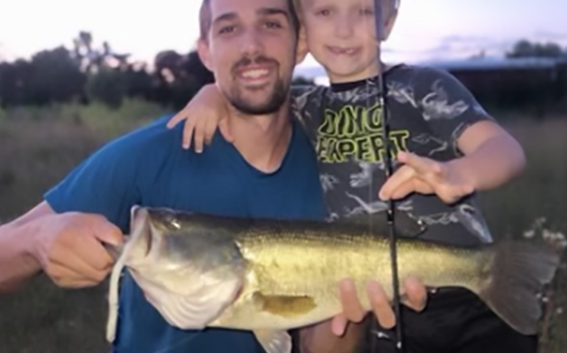 weedless fishing lure worm with father and son and large mouth bass